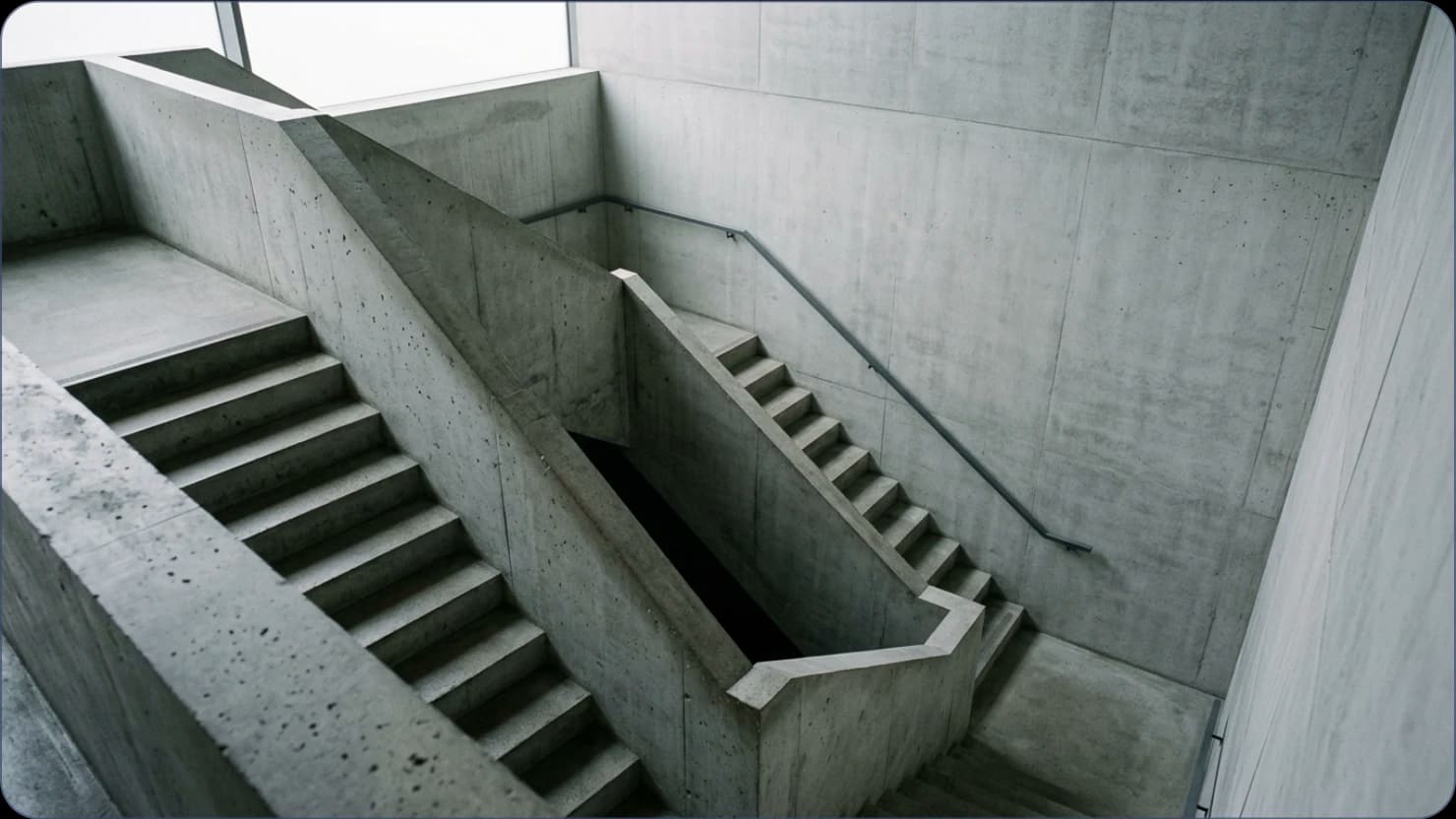 A concrete staircase descending in overcast daylight